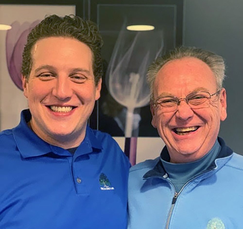 Bob and father Mike after Bob's dental implant treatment